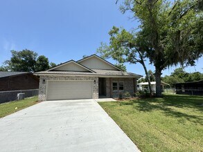 Building Photo - "Charming 4 Bed, 2 Bath Home with Granite ...