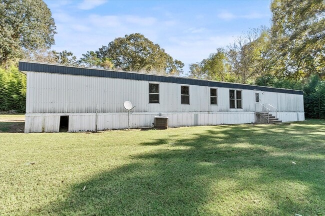 Building Photo - Completely Updated 3BR/2BA Trailer in Musc...