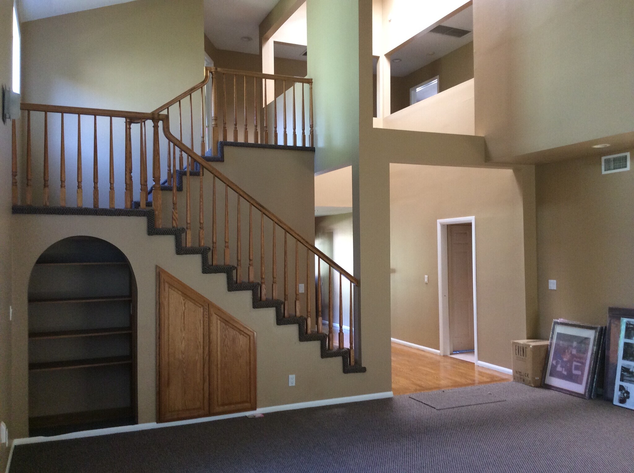 Living room view of staircase - 19251 Oxnard St