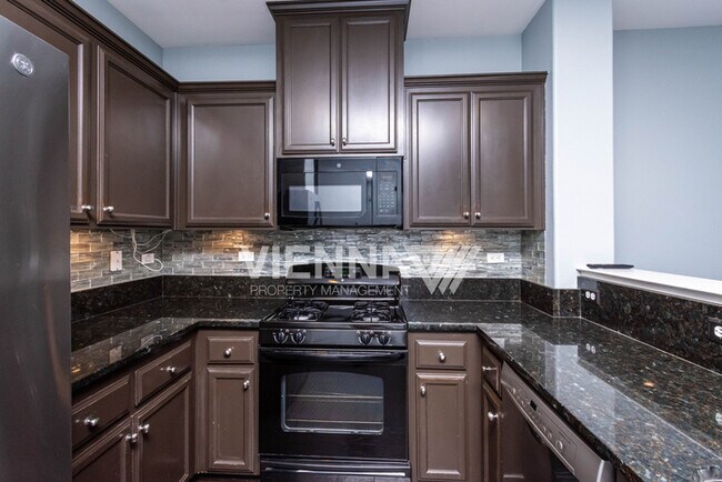 Building Photo - 6216 Lonetree Blvd