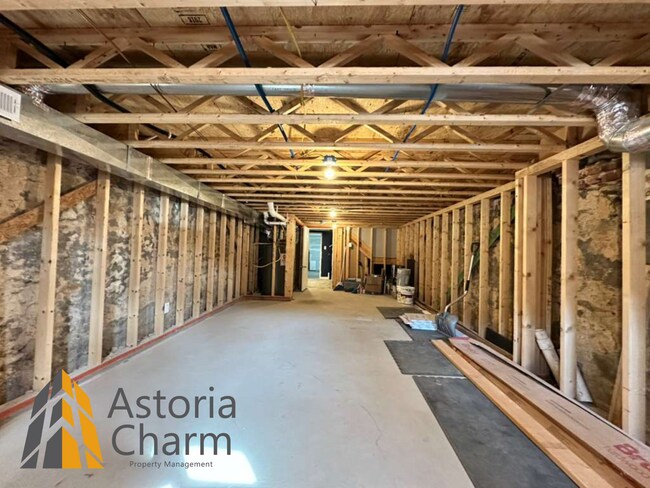 Building Photo - Beautifully Renovated 3BR Rowhome Near Johns Hopkins – Gated Parking + Modern Upgrades