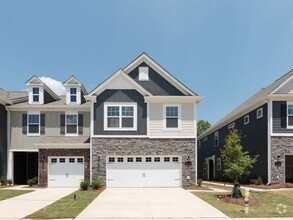 Building Photo - Brand New End-Unit Townhome in Popular Cha...