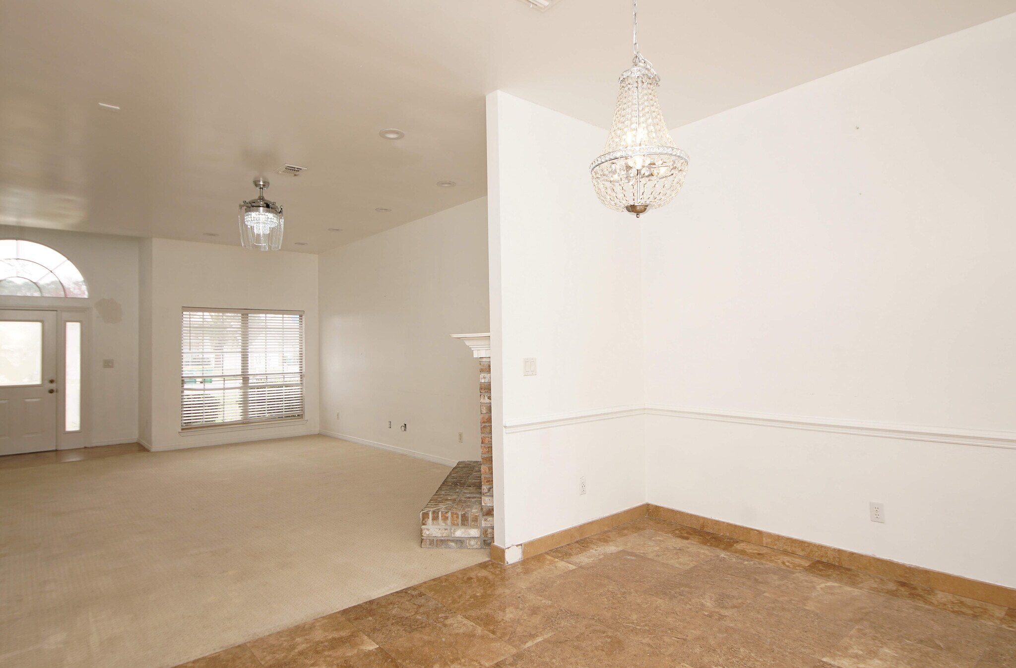 Dining room flowing into the large living room - 23 Ruby Cir