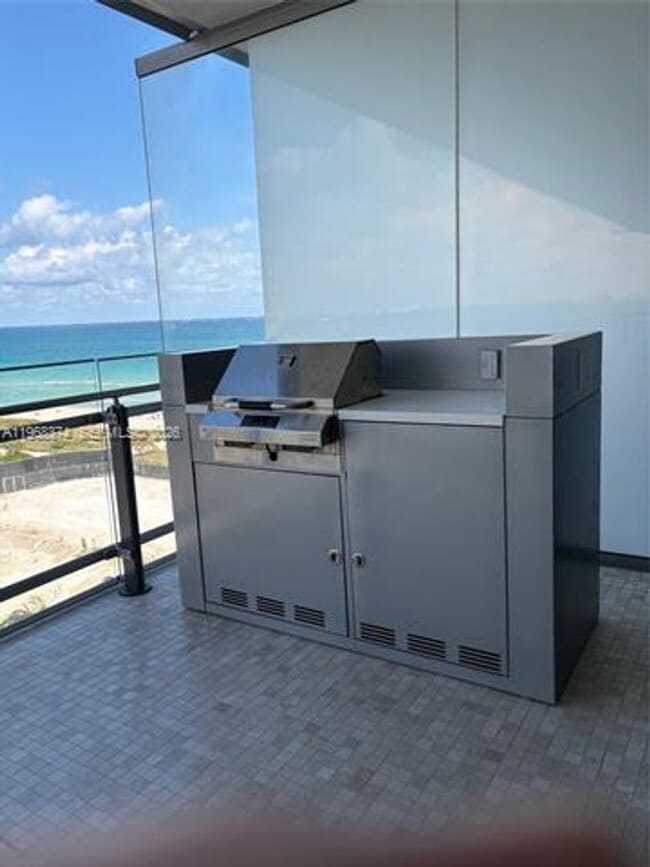 Building Photo - 8701 Collins Ave