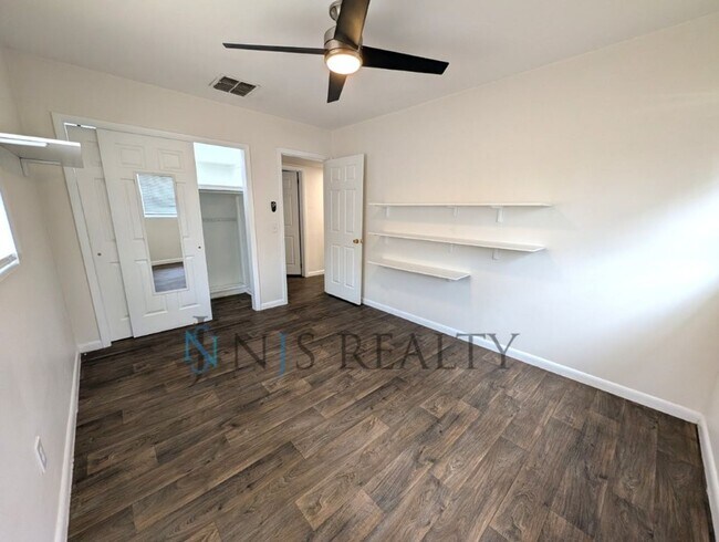 Building Photo - Beautiful 4/2/2 home with a POOL, 1700 Sq. Ft. with fenced yard, TONS of renovations