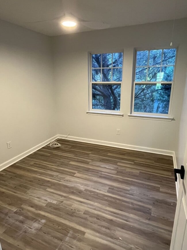 Building Photo - Refreshed 3 Bedroom End Unit Townhome near...