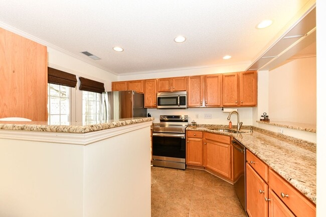 Building Photo - Updated 3 Bedroom Townhome in McAlister's Place