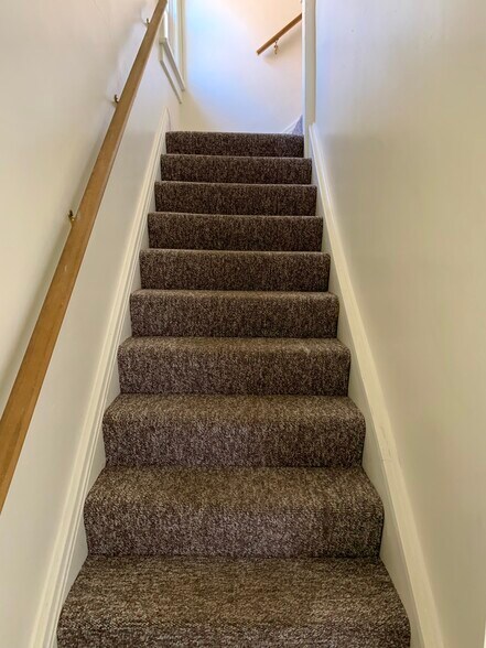 Private stairs to second floor. - 933 Highland Ave