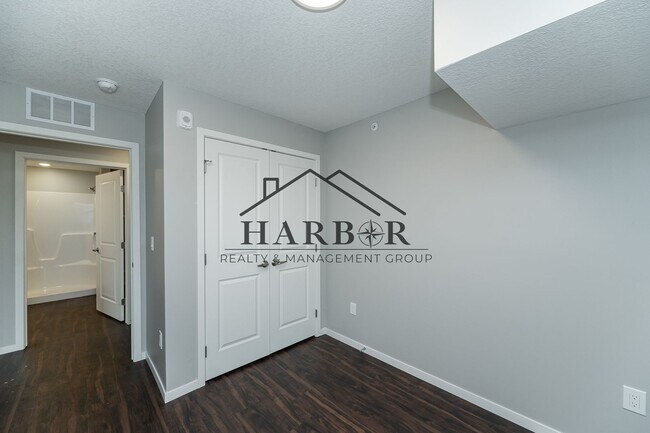 Building Photo - Brand NEW Caroline Apartments 201 -  Move ...