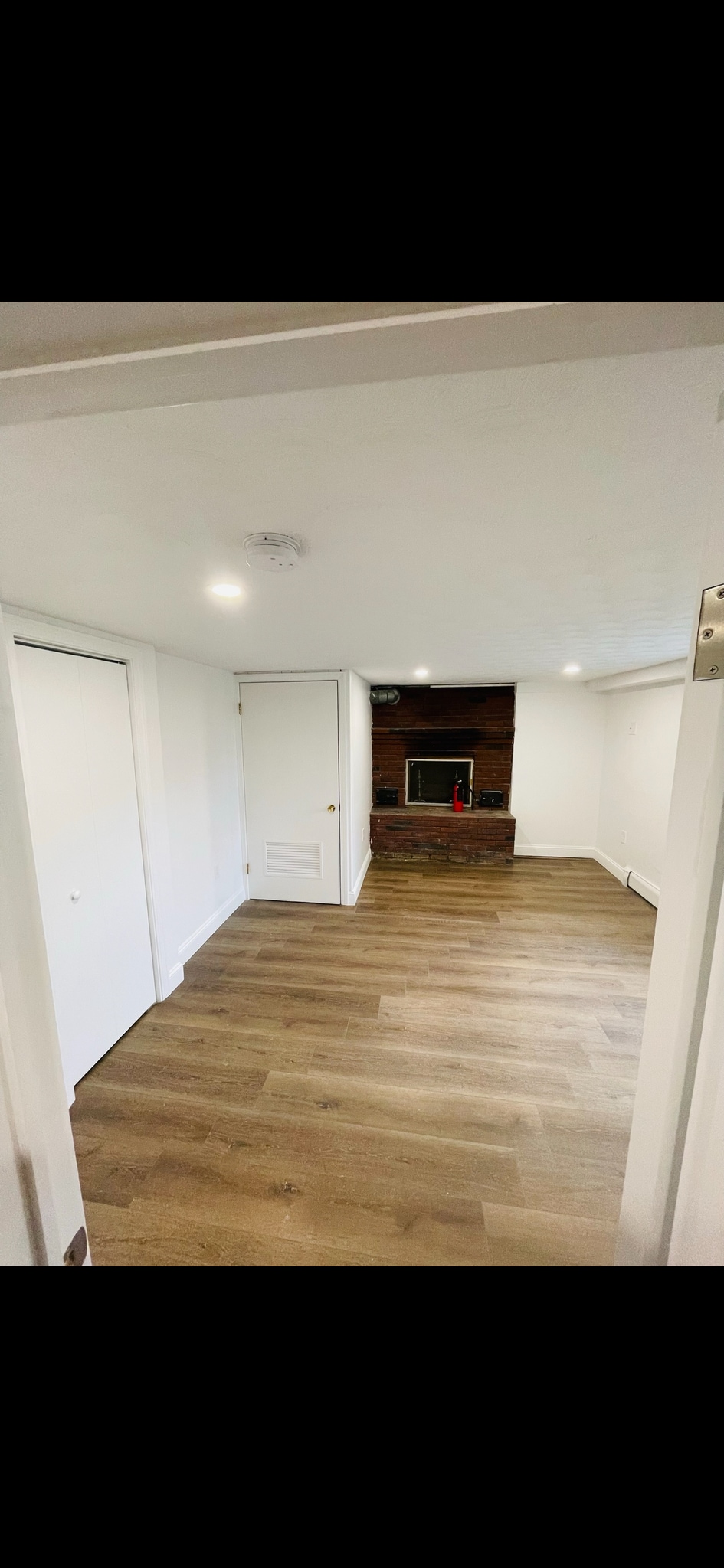 Bedroom #2. Two closets included. Non-working fireplace. Large front facing window. - 31 Stowers St