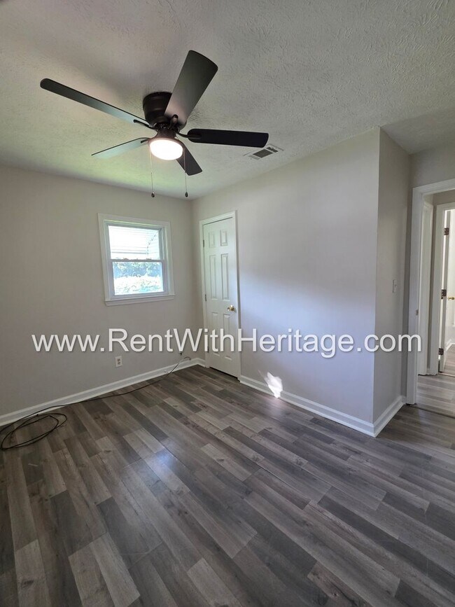 Building Photo - 5990 Peco Ln