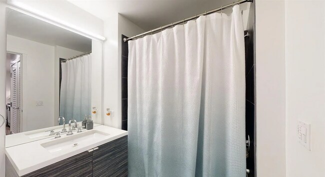 Building Photo - Corner view. Luxury. High end appliances. ...