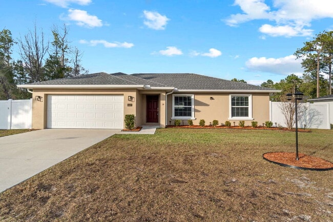 Building Photo - 3BR, 2BA Available Now with Fenced Yard and New Floors, North Marion Oaks