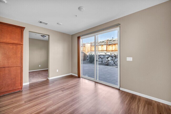 Building Photo - Sun-Filled, Spacious Living with a Three-Car Garage