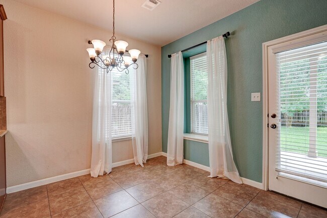 Building Photo - Bright & Roomy 4BR • 2.5BA • Two-Level Living