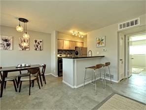 Dining Room, Kitchen Bar, Hall to Bedroom - 1202 Newning Ave