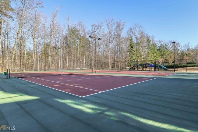 Building Photo - Gorgeous 3-Story Brick Home / 2 Fireplaces / Full Finished Basement / Chapel Hill Schools