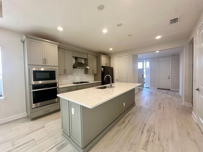 Building Photo - Centrally Located in Growing Area, Gated Community!