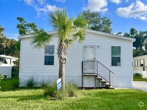 Building Photo - 6550 Hidden Oaks Dr