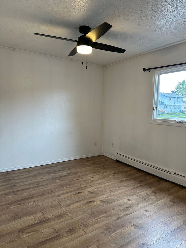 Building Photo - Discover Tranquil Living: Stylishly Updated Ranch-Style Duplex in South Anchorage