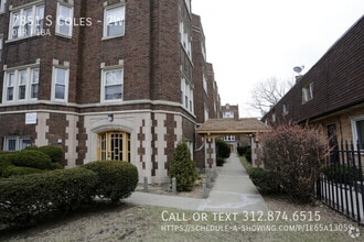 Building Photo - 7851 S Coles-2W