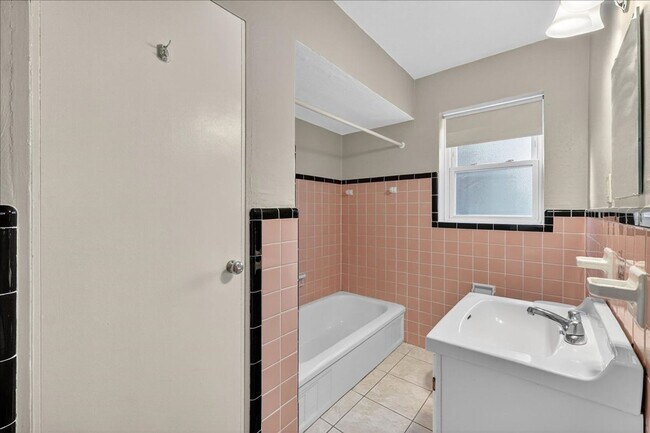 Building Photo - Pink Bathroom Club
