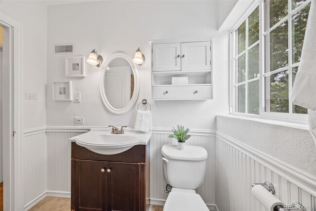 Building Photo - "Spacious 5-Bedroom Gem with Hardwood Floors & Cozy Fireplace in Denver's Heart!"