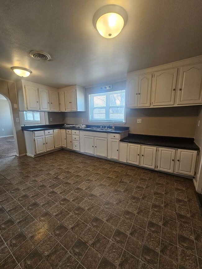 Building Photo - There is a $25 fee for the application and everyone over 18 needs to fill out their own application.