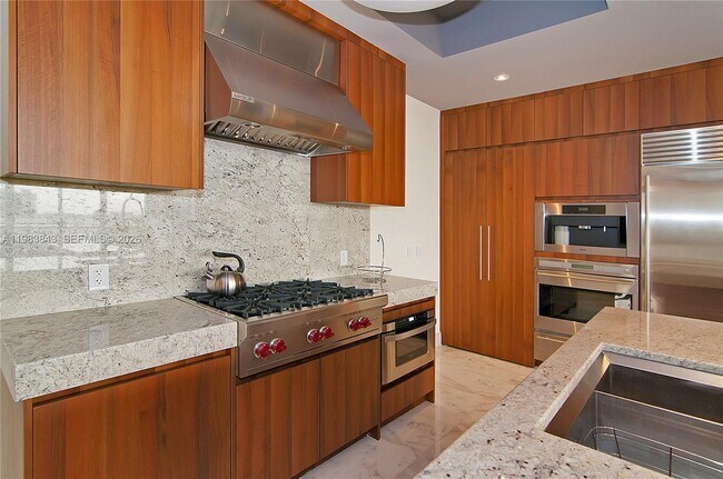 Building Photo - 9705 Collins Ave