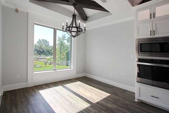 Building Photo - Tour Today! Beautiful 4-Bedroom, 2-Bathroom Home Overlooking a Pond!