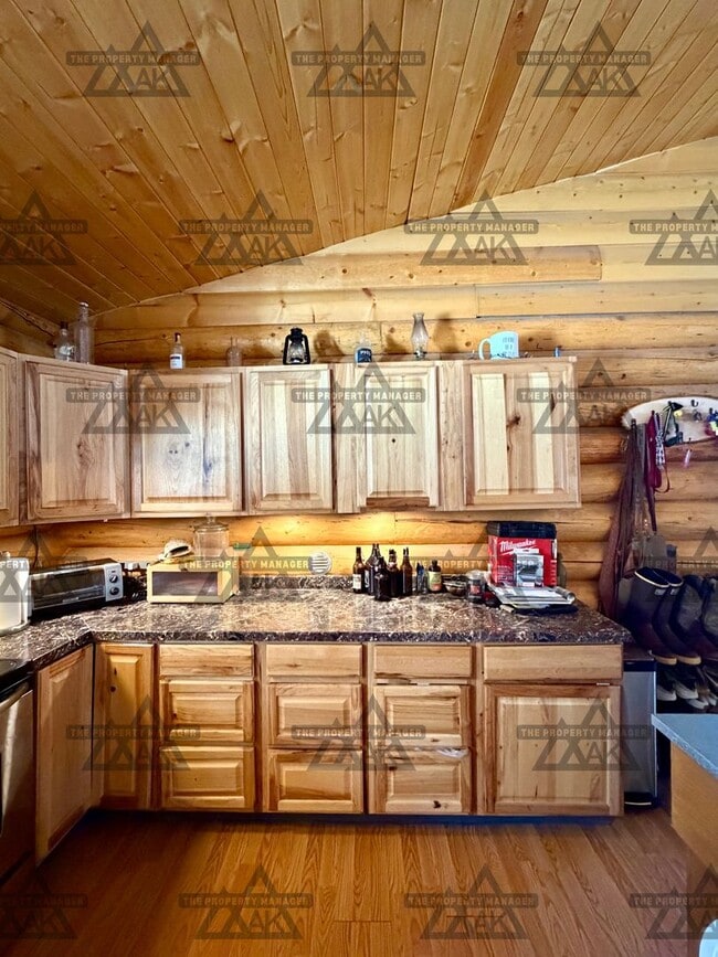Building Photo - Charming Cabin – 2BR Home with Wood Stove - Dog Friendly