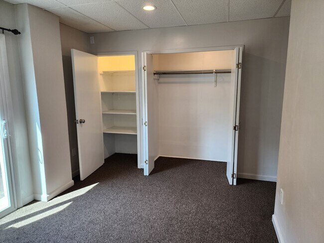 Bedroom 1 has large, lighted closets - 100 Manning Pl