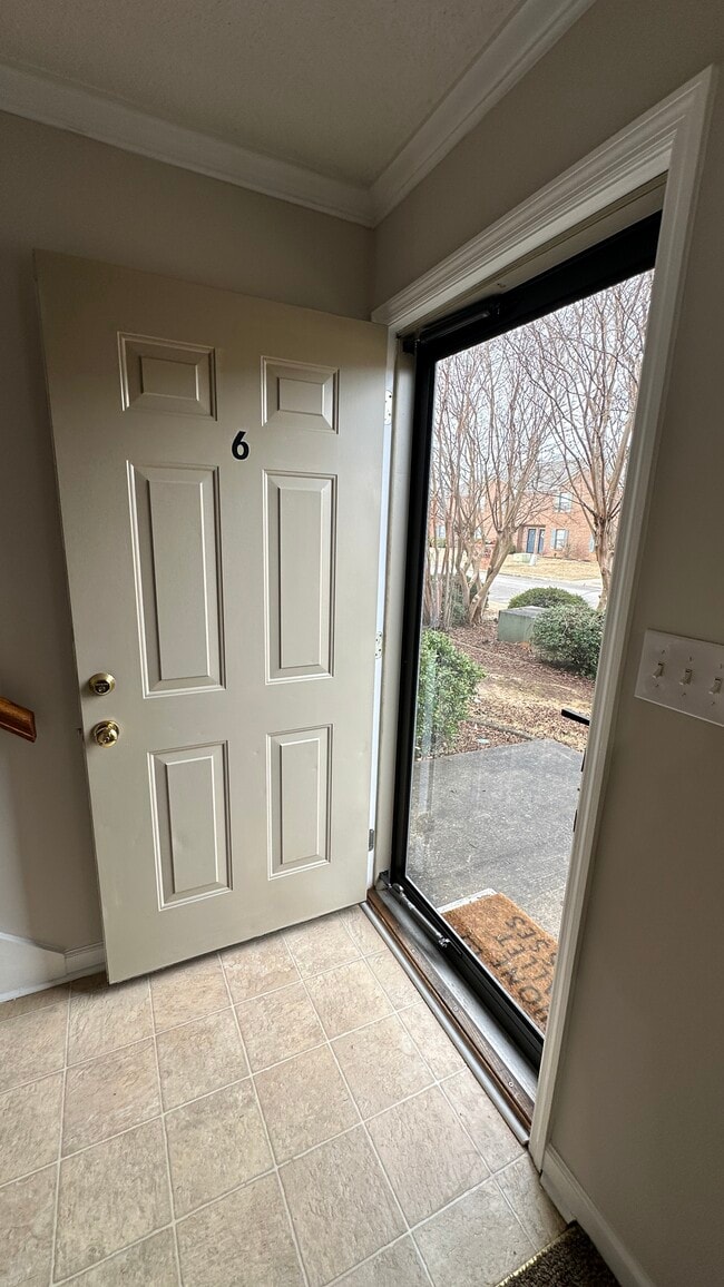 Front door has a new glass storm door with built-in deadbolt. - 1211 Goldridge Dr SW