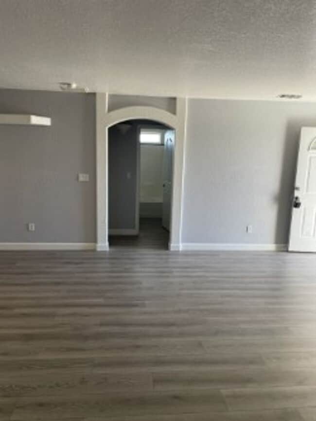 Building Photo - North side home, pet friendly with fenced back yard.