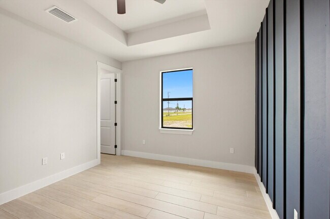 Building Photo - New Construction 3/2 Pool Home on Canal, $2,699, NW Cape Coral. The Only Thing Used Here Is the W...