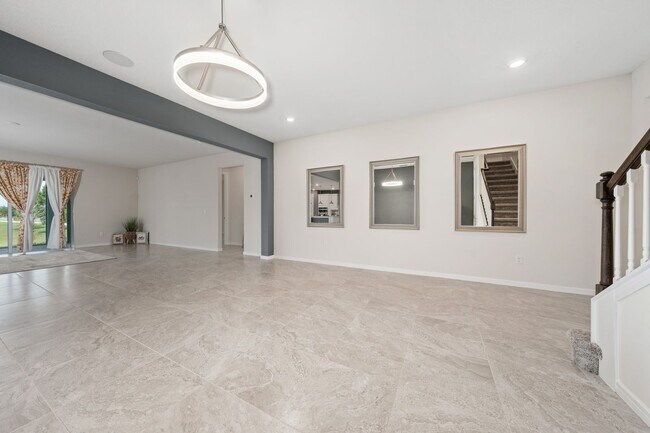 Building Photo - Immaculate Executive Home in Isles of Lake Nona