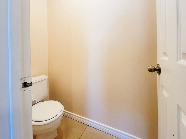 Building Photo - Warm & Inviting 4BR / 2.5BA Home with Covered Deck and 2-Car Garage