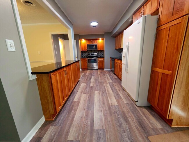 Building Photo - Nicely updated 3 bedroom, 2 bath home with 1-car garage