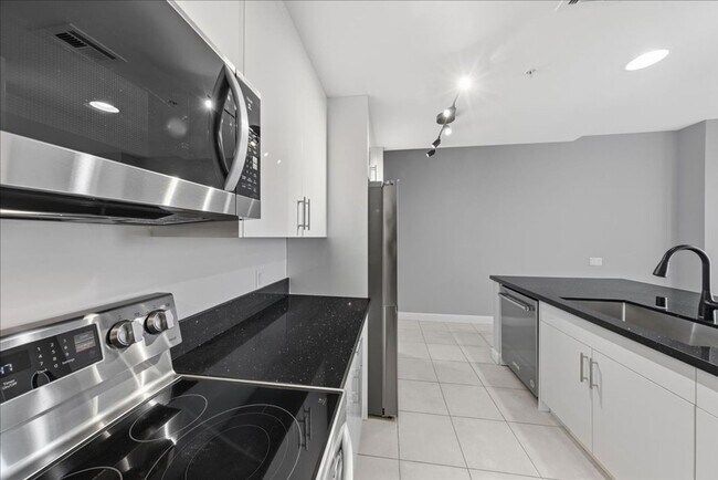 Building Photo - Stunningly Remodeled Studio High-Rise Unit For Rent