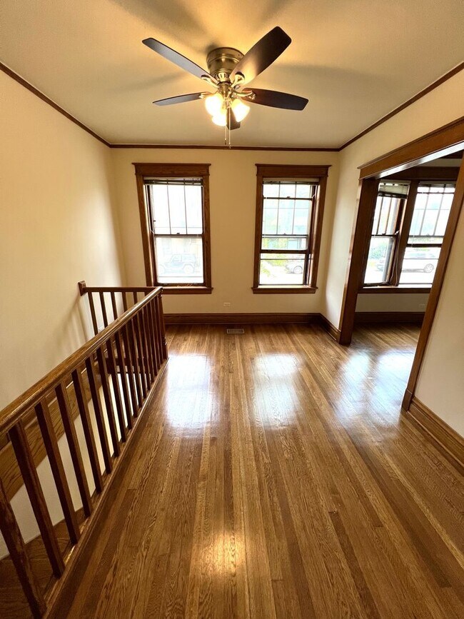 Building Photo - Stunning updated Wrigleyville 4-bed, 3-bath duplex featuring a modern kitchen, renovated baths & ...