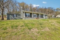 Building Photo - Experience the perfect blend of privacy and open space in this beautifully maintained 3-bedroom, ...