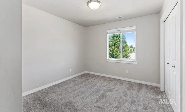 Building Photo - Stunning 4-Bedroom Home with Privacy & Low-Maintenance Living in Verado