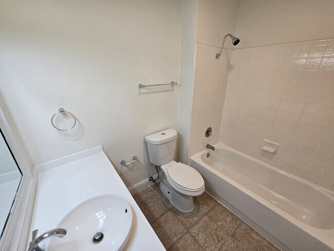 Building Photo - Updated, Energy Efficient 4 Bedroom 2 Bath Home in Golf Course Community