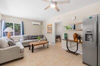 Building Photo - Cozy 2BR Home with Bright Interior & Relaxing Patio