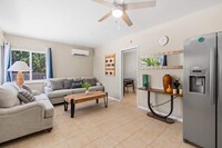 Building Photo - Cozy 2BR Home with Bright Interior & Relax...