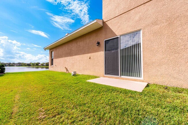 Building Photo - St. Cloud 4 Bedroom, 4 Bathroom Pool Home with Lake View