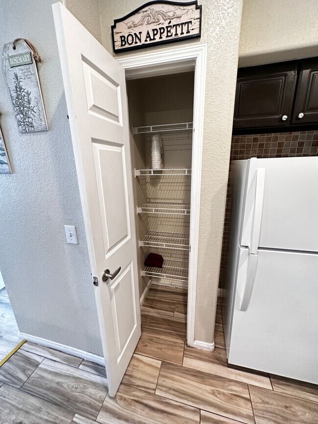 Building Photo - Fully Furnished 2 Bedroom 1 Story Condo