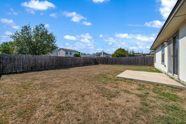 Building Photo - 4935 Dahlia Terrace