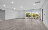 Building Photo - 7040 Woodman Ave