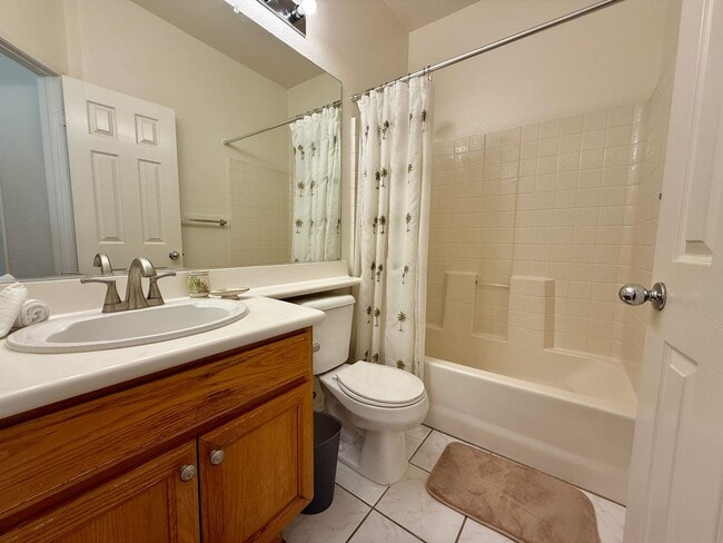 Building Photo - Spacious 3 Bedroom 2.5 Bath Townhouse with Private Garden Patio & a Community Pool/Spa! Attached ...
